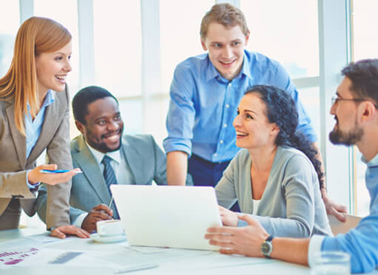 Office team collaborating with blurred background