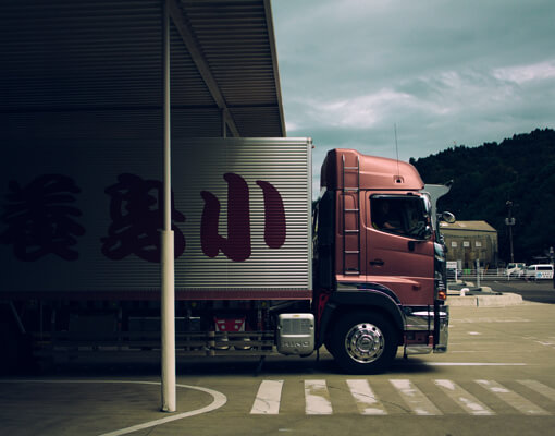 Truck driving away on highway