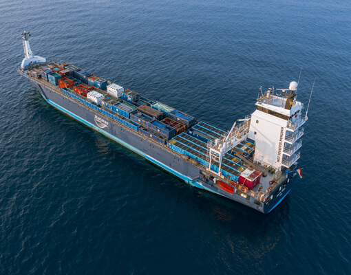 Cargo ship sailing on open sea
